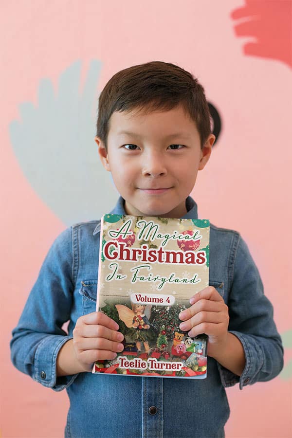 book-mockup-of-a-happy-kid-showing-off-his-book-23717