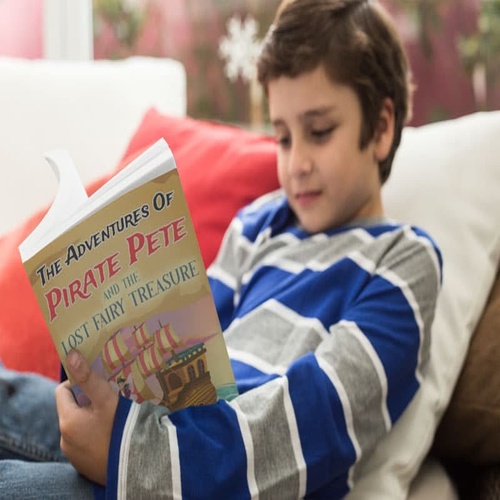 focused-boy-reading-pirate-pete-500x500