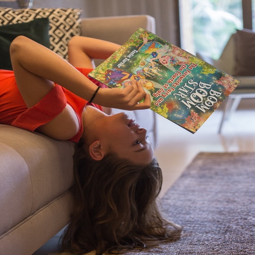 girl-reading-book-upside-down-500x500